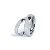 Silver wedding bands for couples on white background