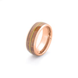 rose gold male wedding band with wood and guitar string inlay