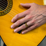 rose gold wedding band for him made with recycled guitar wood