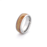 a mens silver wedding band featuring a wood and guitar string inlay