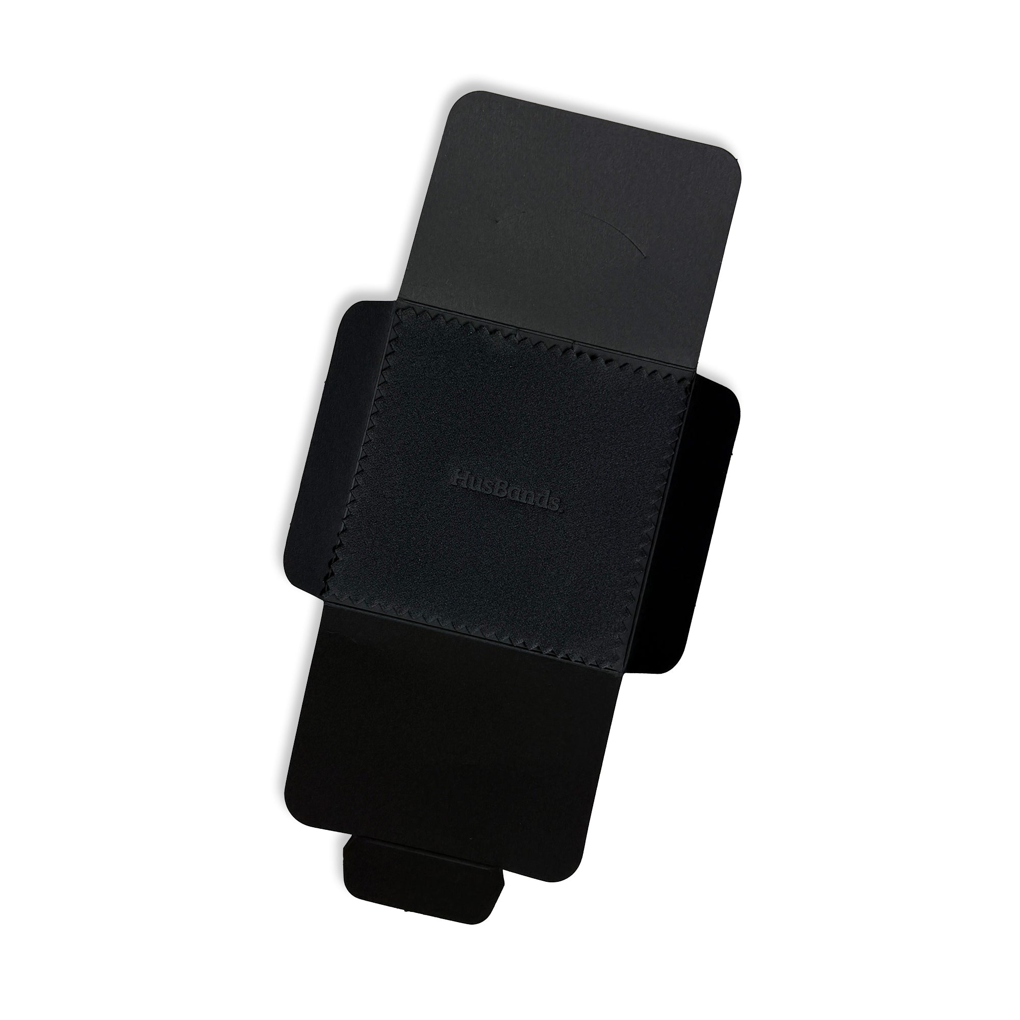 Close-up of gold and silver polishing cloth with soft microfiber texture