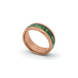 Close-up of an 8mm rose gold band featuring natural green moss agate, displayed against a white backdrop.