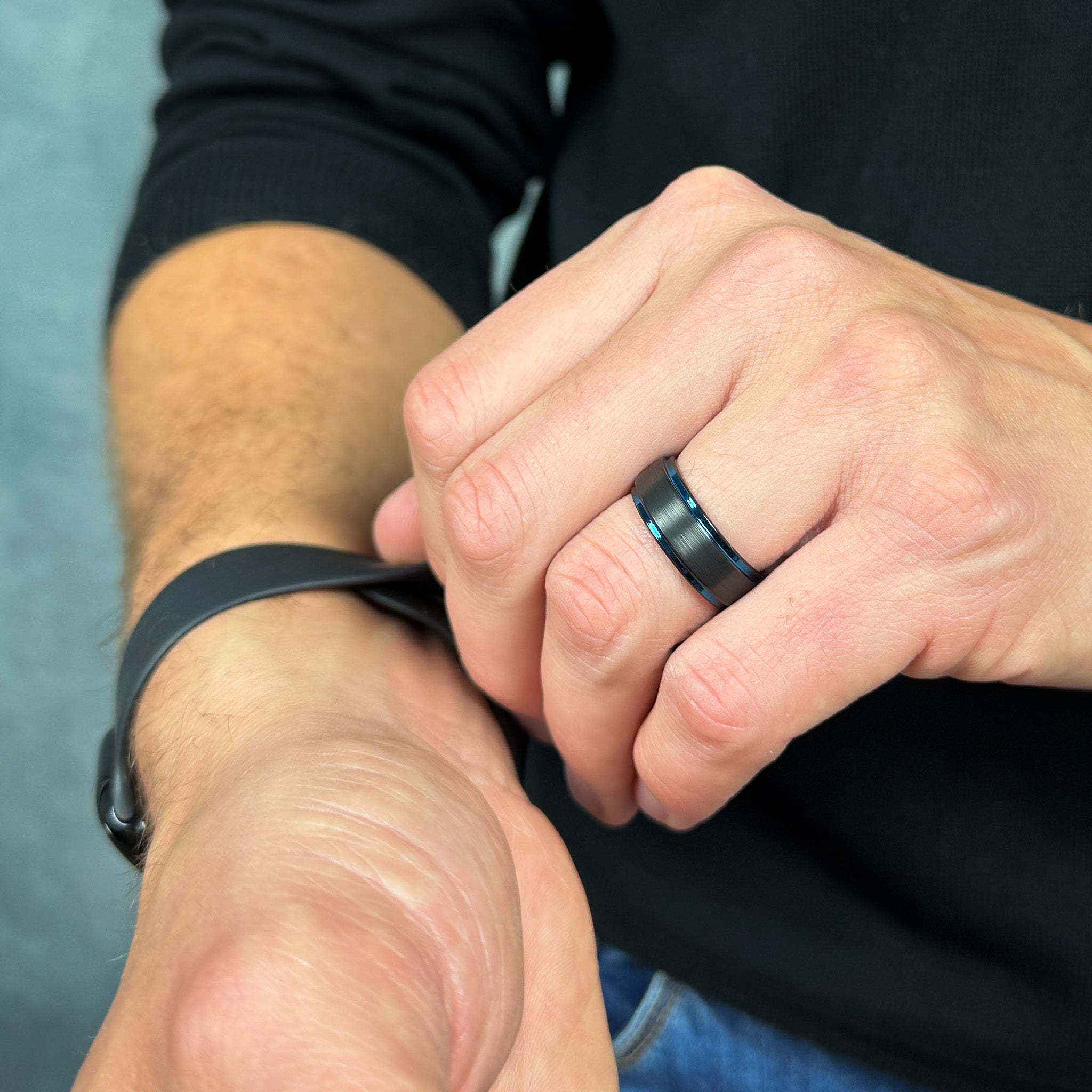 mens black brushed tungsten ring with polished blue beveled edges