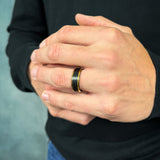 mens black brushed tungsten ring with polished gold beveled edges