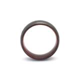 mens black tungsten wedding ring with beveled sides and a recycled maple wood sleeve top view