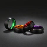 a collection of black wedding bands with bright coloured sleeve