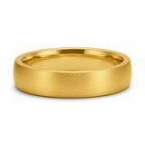4mm brushed gold tungsten wedding ring lying flat showing the brushed finish and polished comfort fit interior