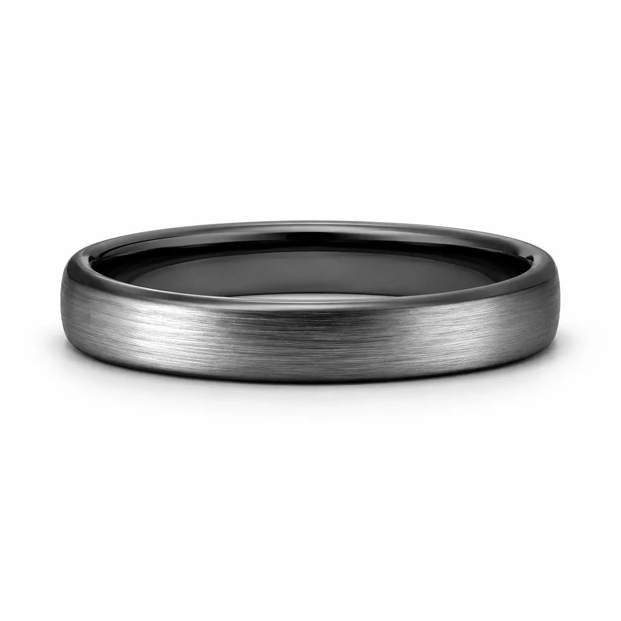 Brushed silver 4mm tungsten ring with polished black interior lying flat on a white studio background