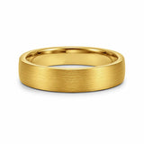 6mm brushed gold tungsten wedding ring lying flat showing the brushed finish and polished comfort fit interior