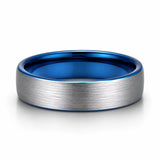 Brushed silver 6mm tungsten wedding ring with polished blue inner band lying flat on a white studio background