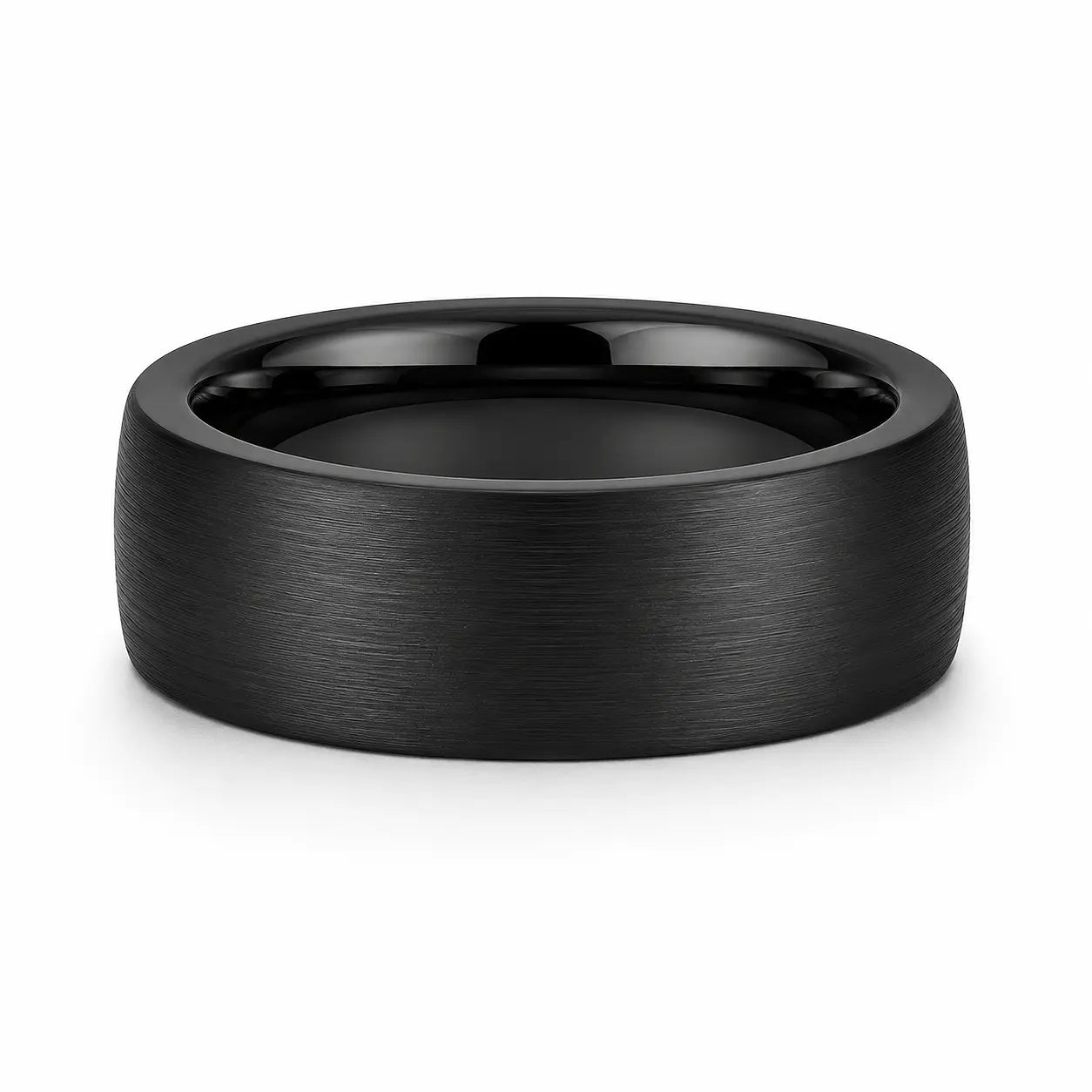 8mm brushed black tungsten wedding ring lying flat showing the brushed outer finish and polished comfort fit interior.
