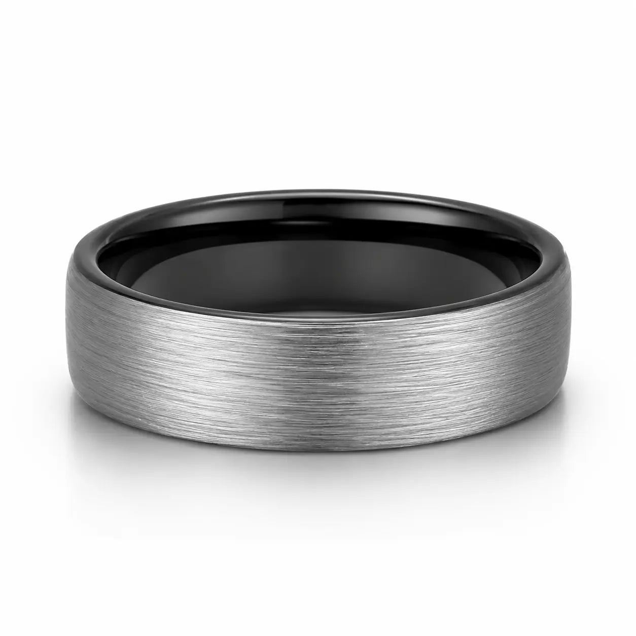 Brushed silver 8mm tungsten wedding ring with polished black inner band lying flat on a white studio background