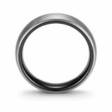 Side view of an 8mm brushed silver tungsten wedding ring with polished black inner band on a white background