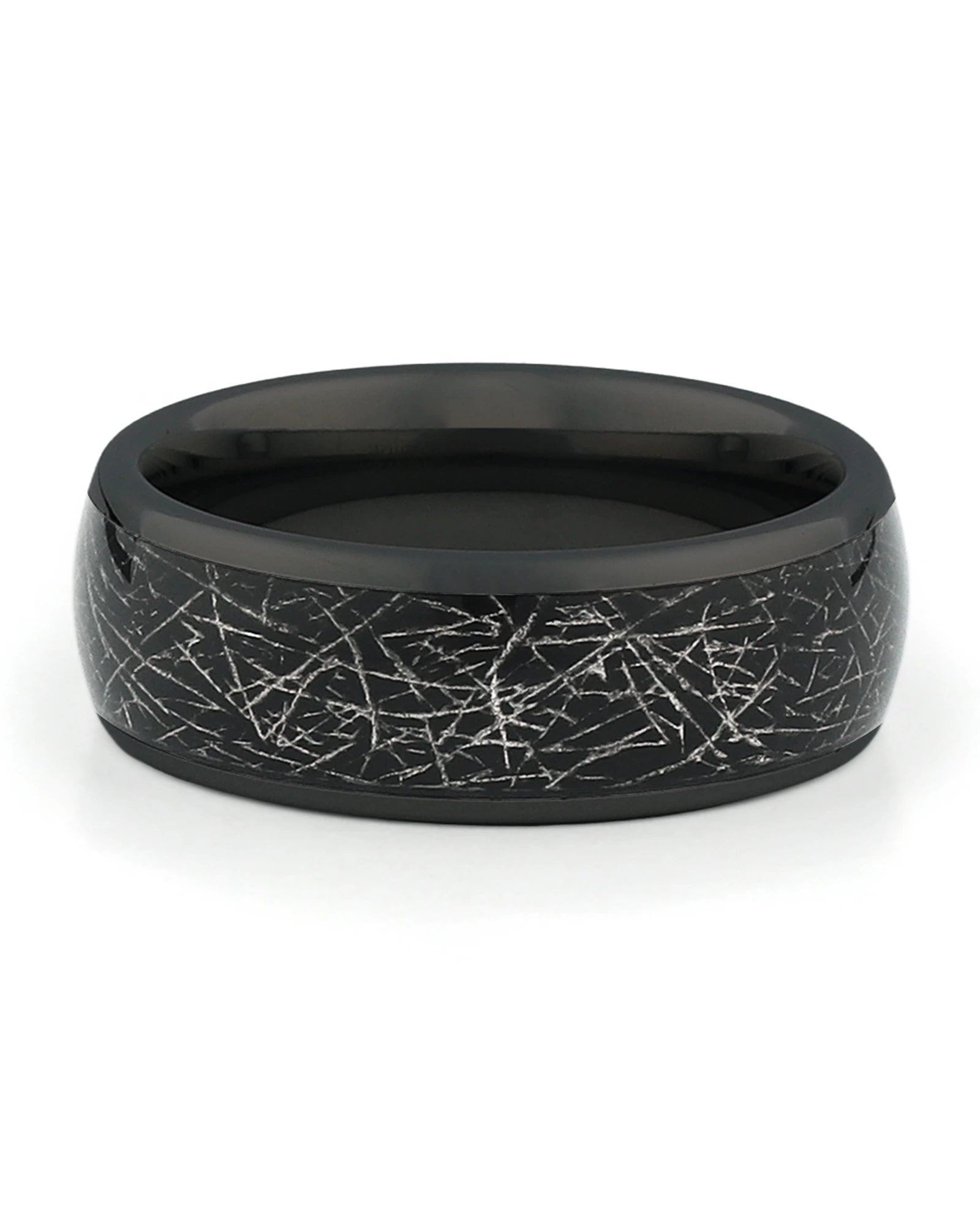 Close view of black tungsten ring with galaxy meteorite inlay