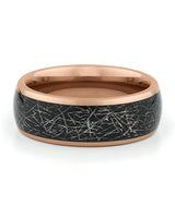 Close view of rose gold tungsten ring with galaxy meteorite inlay