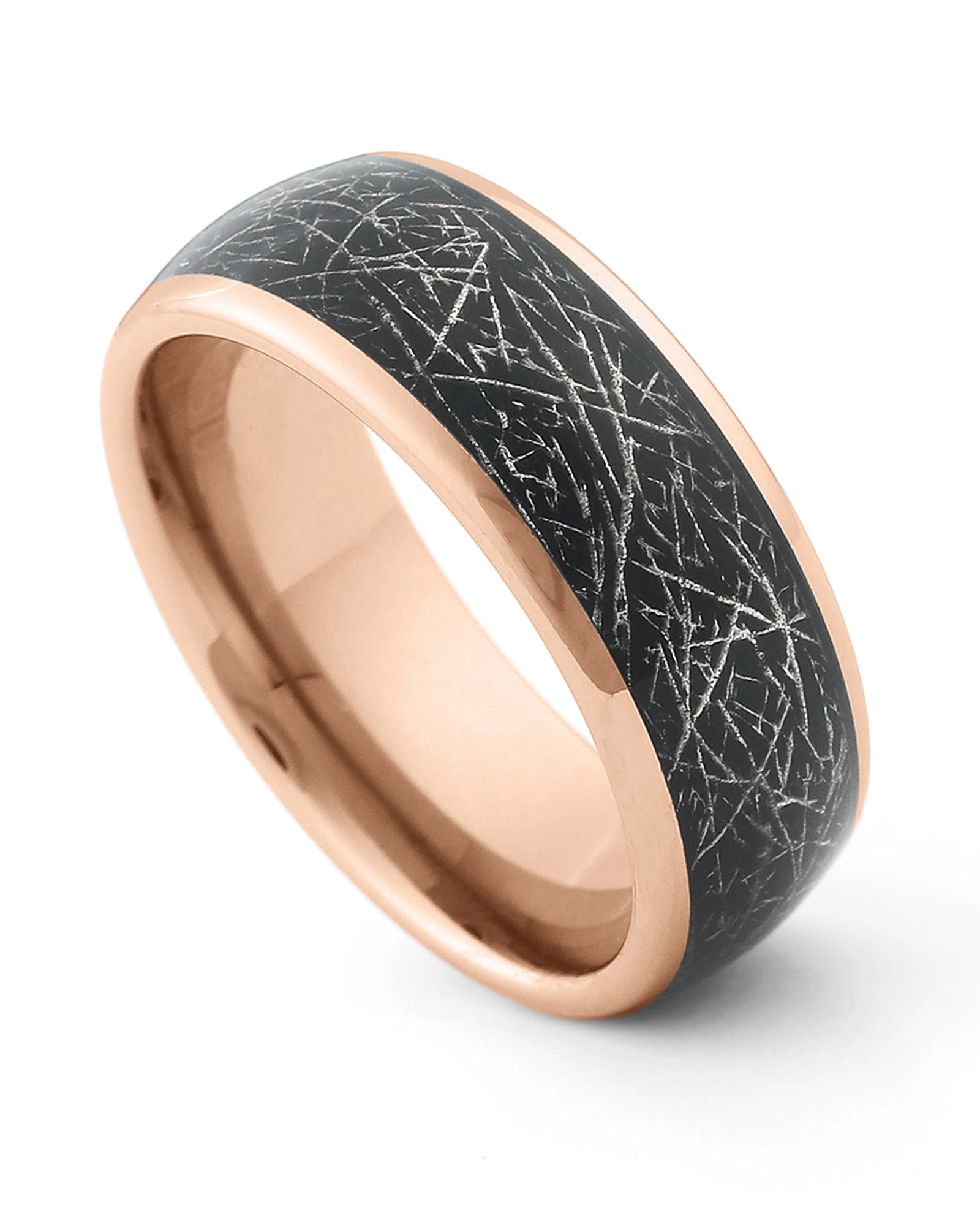 Rose gold galaxy and meteorite tungsten ring shown at an angle
