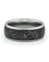Close view of silver tungsten ring with galaxy meteorite inlay