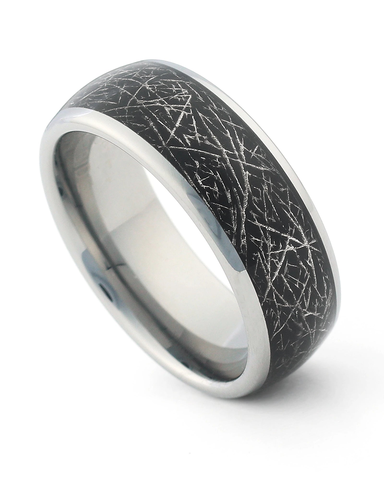 Silver galaxy and meteorite tungsten ring shown at an angle