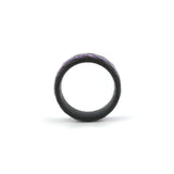 black wedding ring with purple amethyst inlay