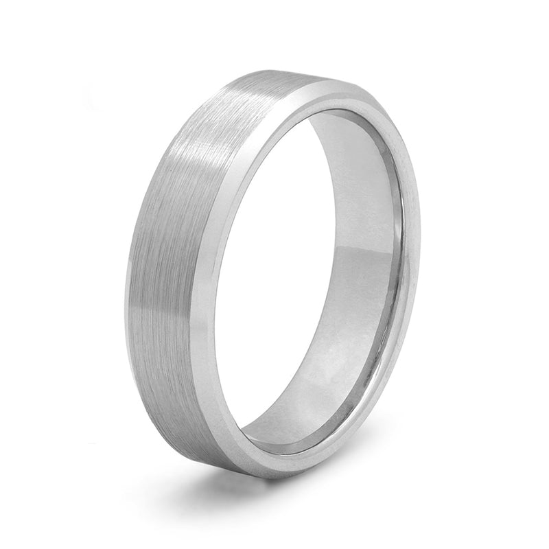 Silver beveled tungsten wedding band on a clean light background with minimalist masculine styling.