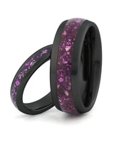 Matching black tungsten wedding rings with purple amethyst stone inlays