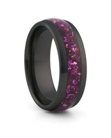 Black 8mm tungsten ring with purple amethyst inlay shown at an angle