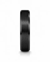 Front view of a black beveled tungsten wedding ring with a whiskey barrel wood inner sleeve on a white background.