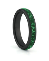 Black 4mm tungsten ring with green emerald inlay shown at an angle