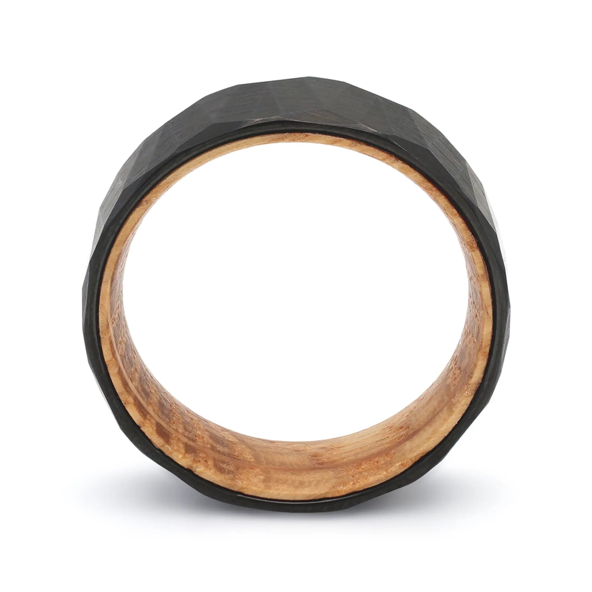 Side profile of a black geometric tungsten whiskey barrel wedding ring with reclaimed oak wood.