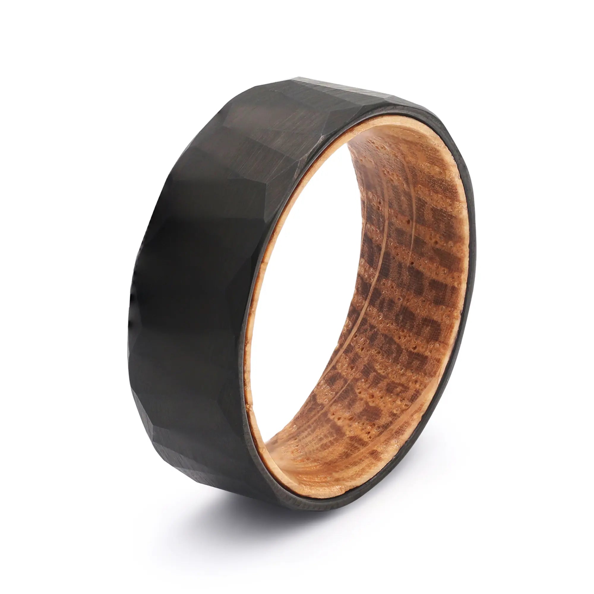 Black geometric tungsten whiskey barrel wedding ring with a real oak wood interior.