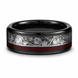 Black tungsten wedding ring with a genuine red guitar string inlay lying flat on a white studio background, showing the full width of the band and polished comfort fit interior.
