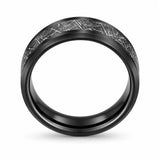 Front view of a black tungsten wedding ring with a meteorite inspired textured inlay and polished comfort fit interior on a white background.