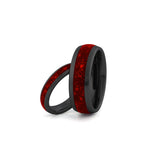 Black ruby couples ring set matching tungsten wedding bands with red gemstone detail