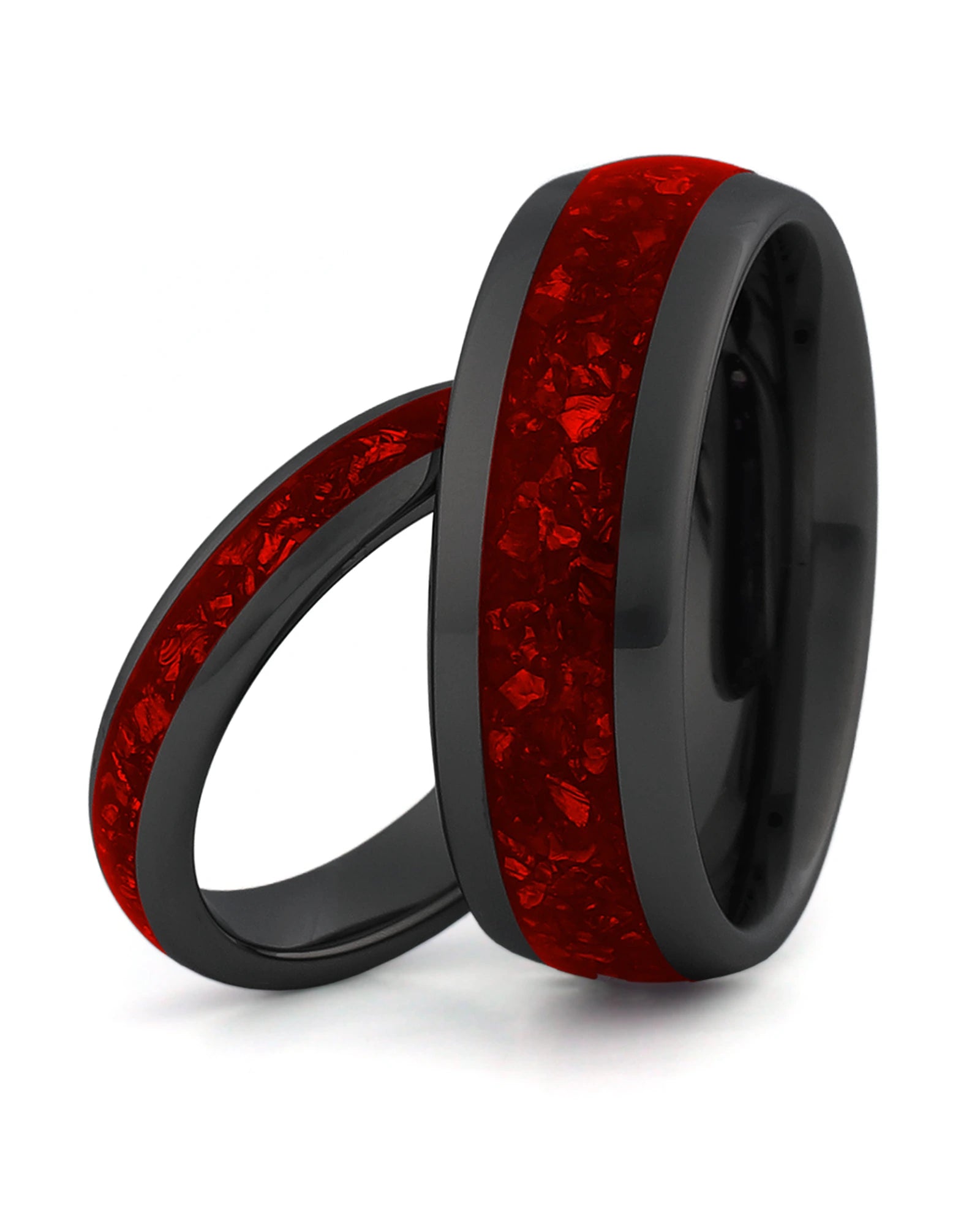 Matching black tungsten wedding rings with red ruby stone inlays