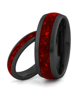 Matching black tungsten wedding rings with red ruby stone inlays