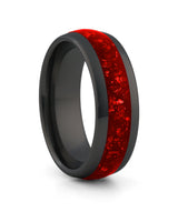 Black 8mm tungsten ring with red ruby inlay shown at an angle
