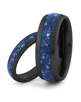 Matching black tungsten wedding rings with blue sapphire stone inlays