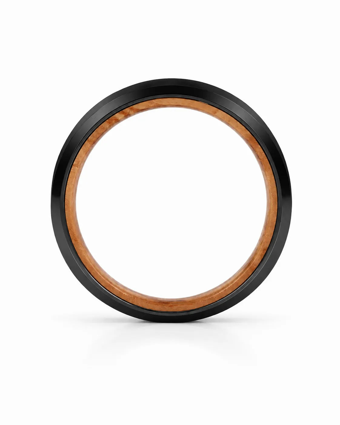Side profile of a black brushed tungsten wedding ring showing the band thickness, polished beveled edges and whiskey barrel wood interior on a white background.