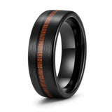 Black brushed tungsten wedding ring with a genuine wooden inlay shown at an angled studio view on a white background.