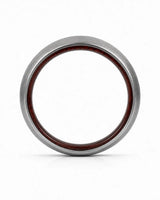 Front view of a brushed silver tungsten wedding ring with a maple wood sleeve interior.