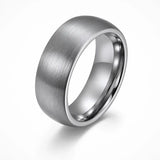 Brushed silver tungsten wedding ring with comfort fit interior shown at an angled front view on a white background.