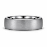 Brushed silver tungsten wedding ring lying flat showing the brushed outer surface and polished comfort fit interior.