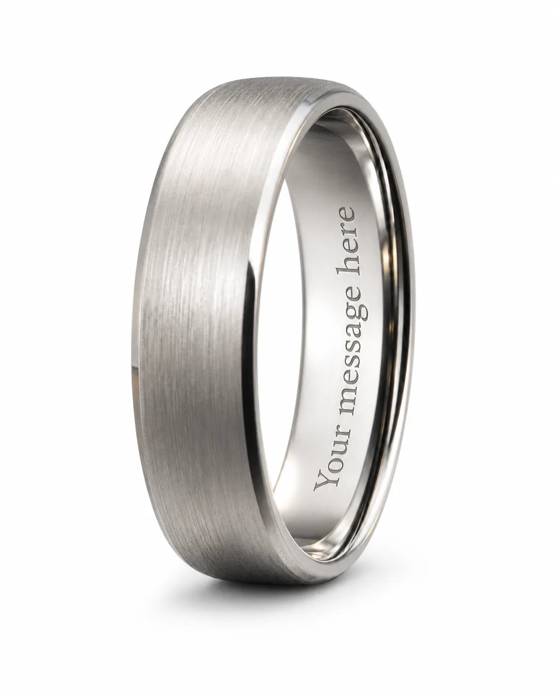 Brushed silver wedding ring with “Your message here” engraved inside