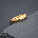 Scratch-proof gold women’s wedding band with multi-faceted polished tungsten