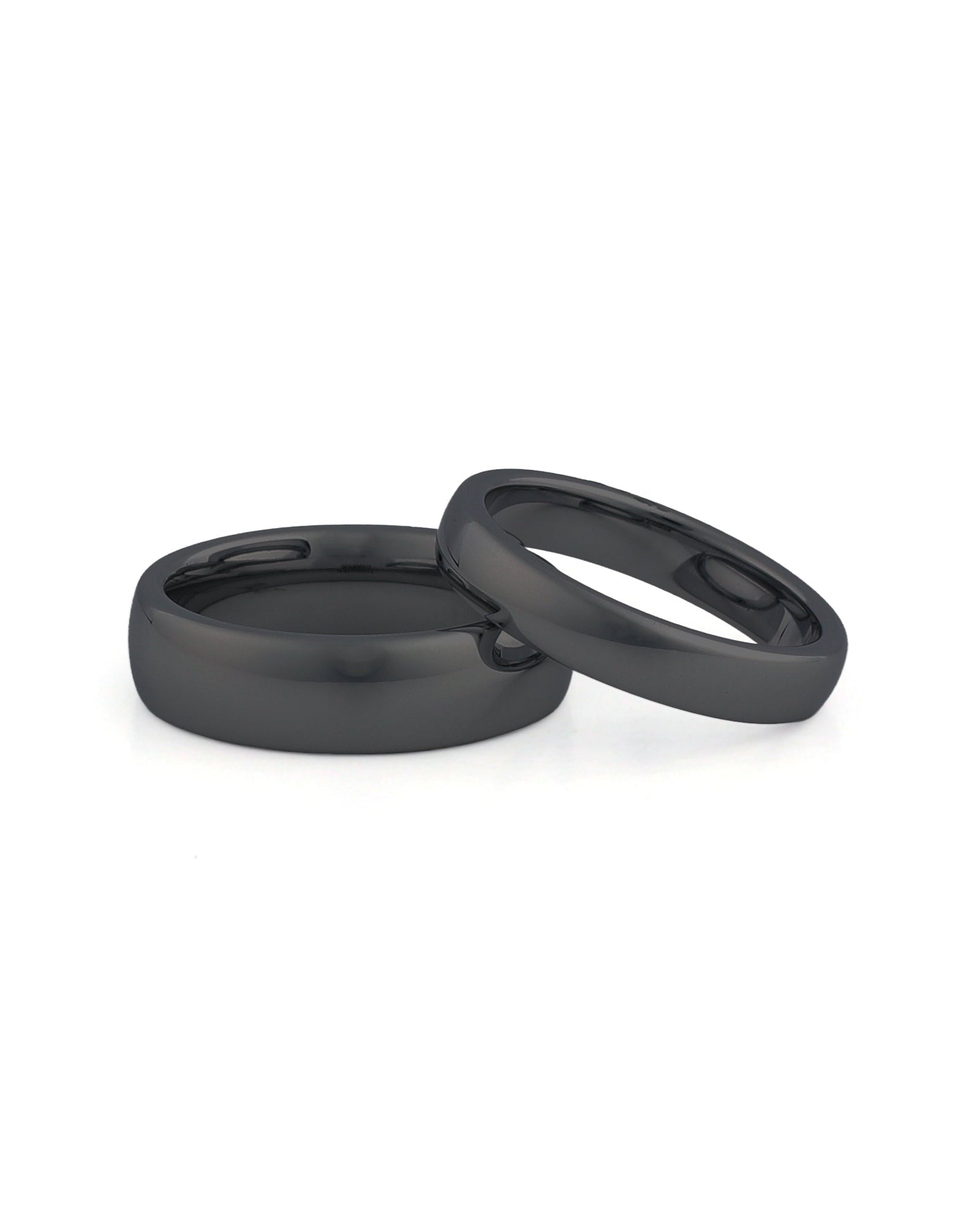 his and hers black tungsten wedding rings side by side