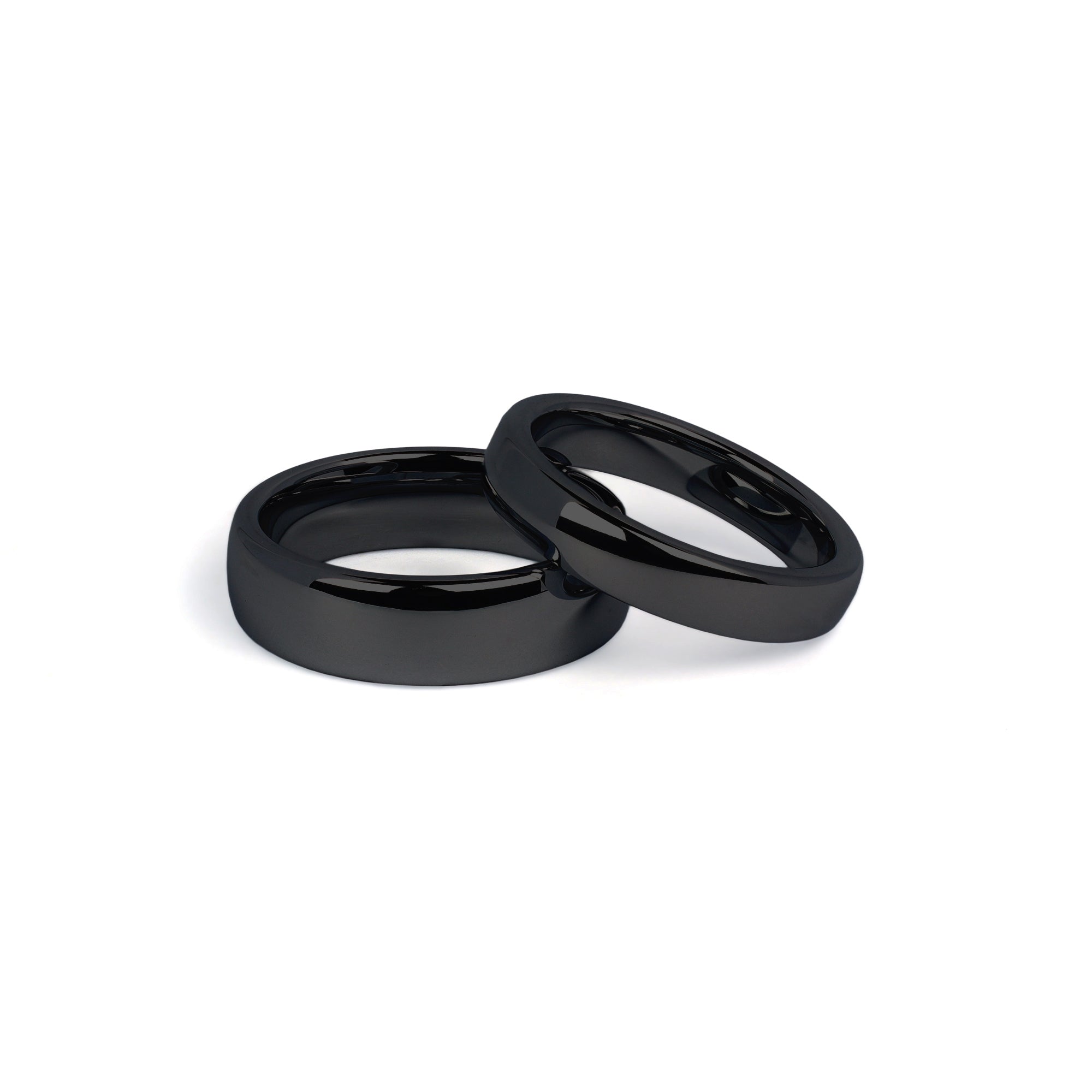 his and hers black tungsten wedding rings side by side