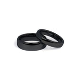 his and hers black tungsten wedding rings side by side