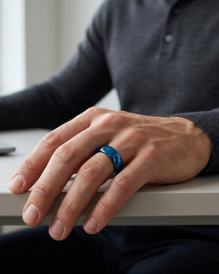 man wearing an 8mm polished blue tungsten wedding ring