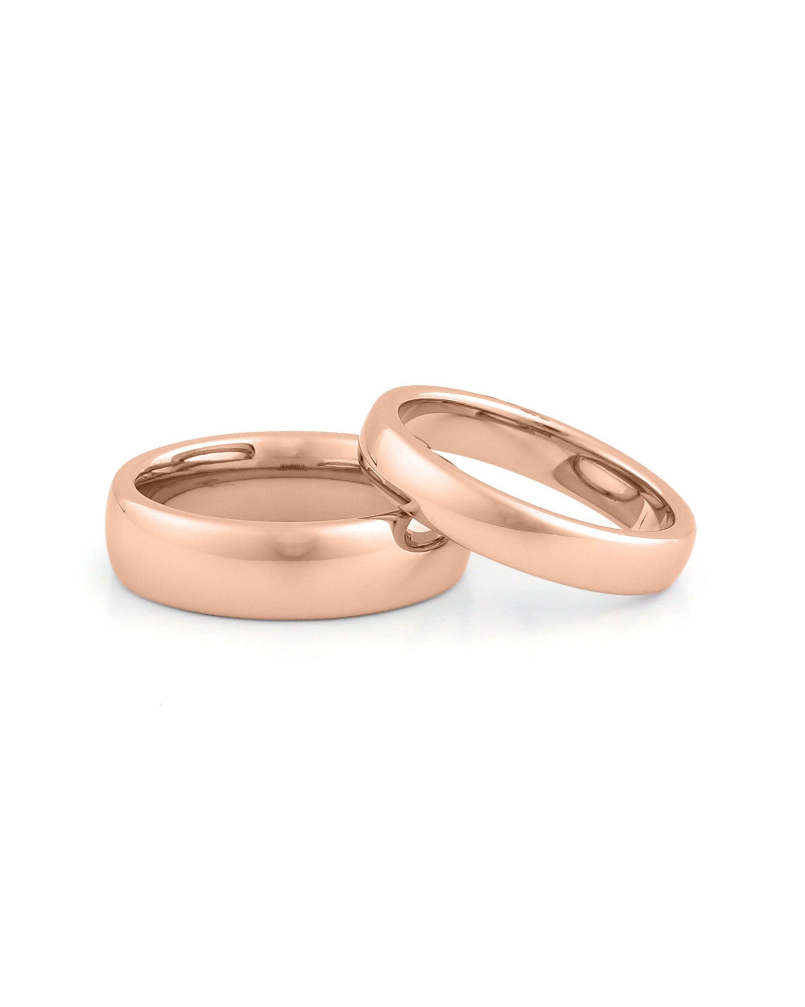 Matching rose gold wedding bands with comfort fit design for couples