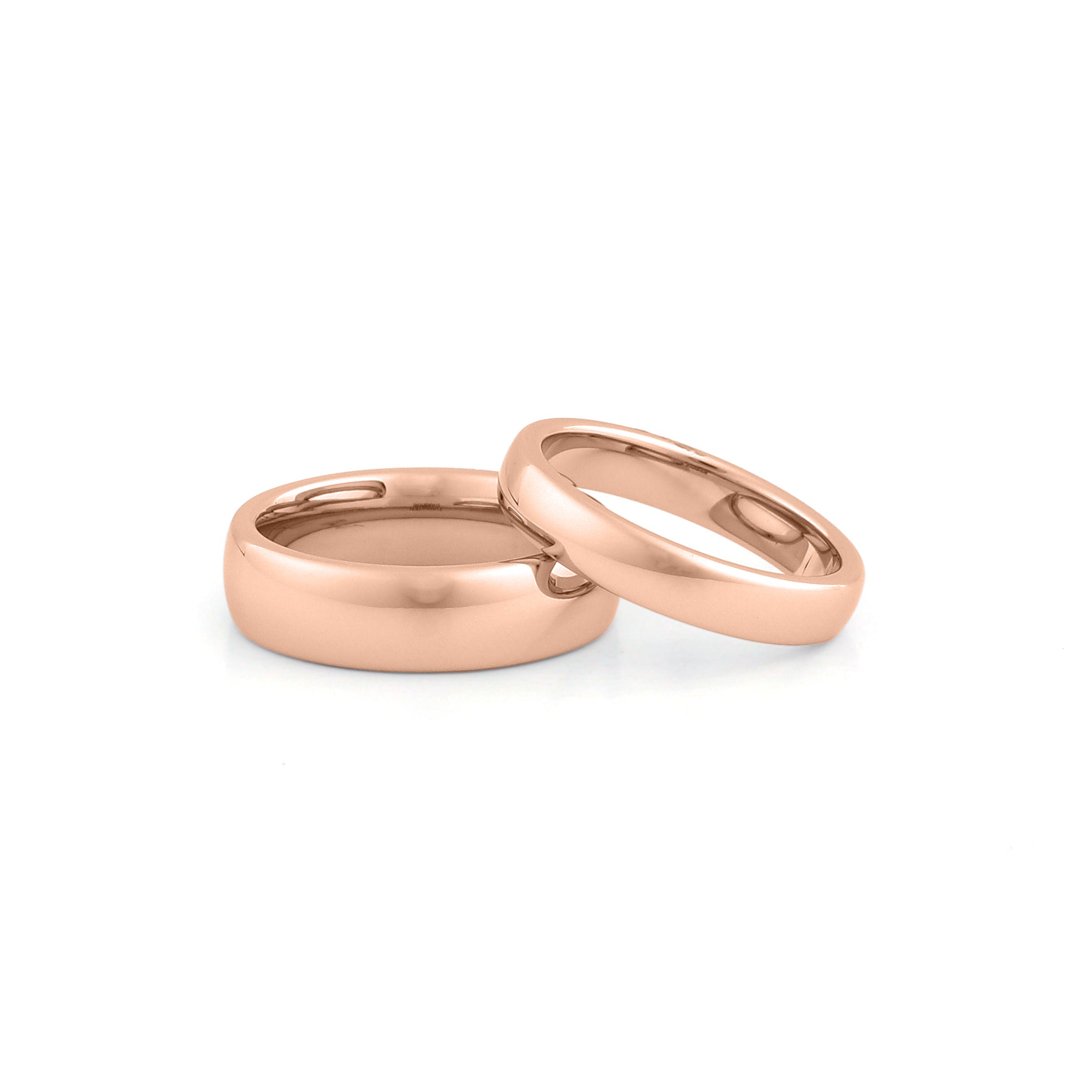 Matching rose gold wedding bands with comfort fit design for couples